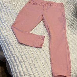 Pink Levi stretch jeans.
